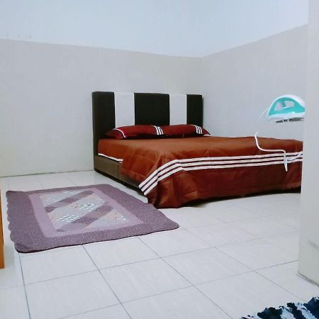 קואלה קנגסאר Homestay Ummi Razzin מראה חיצוני תמונה